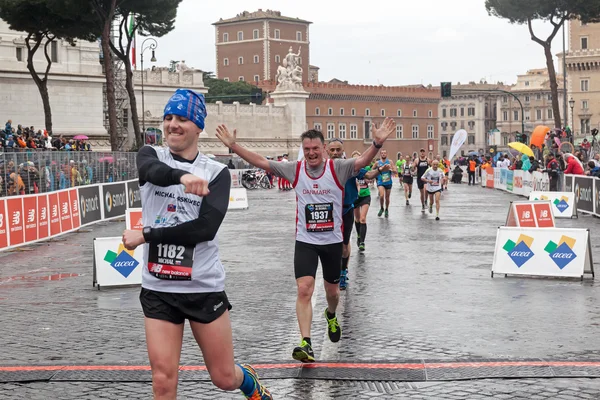 Athletes at the finish — Stock Photo, Image