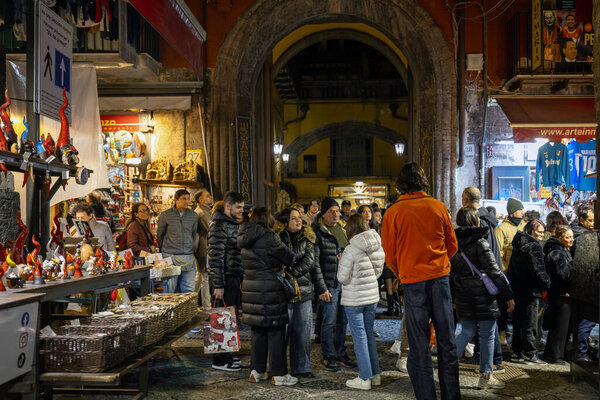 Naples, Italy - December 26, 2025: Via di San Gregorio Armeno, in the historic center, a tourist destination during the Christmas holidays due to the presence of numerous stalls of local crafts.