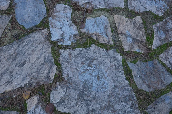 The pebble stone floors and wall, background textures in spain