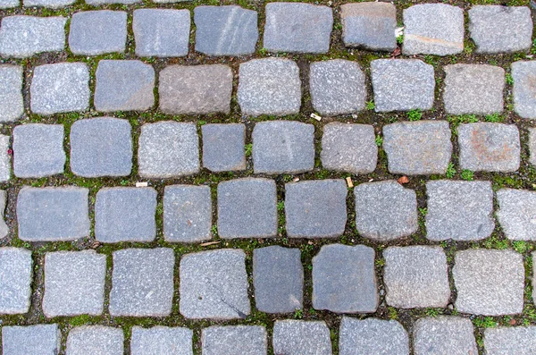 Close-up cobblestones as texture or background — Stock Photo, Image