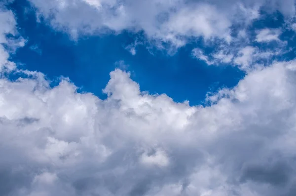 View into impressive spring sky with thick clouds as a texture or background