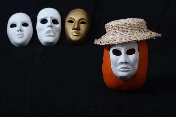 Theatrical mask standing on a dark background — Stock Photo, Image