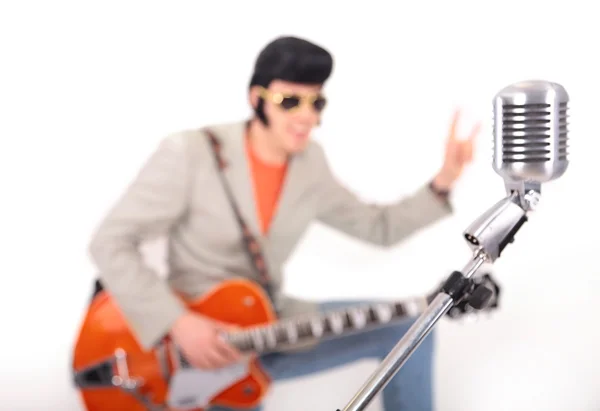 Elvis Presley plays guitar and sings — Stock Image Elvis Presley plays guitar and sings Stock Photo
