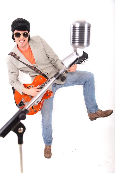 Elvis Presley plays guitar and sings — Stock Image Elvis Presley plays guitar and sings Stock Picture