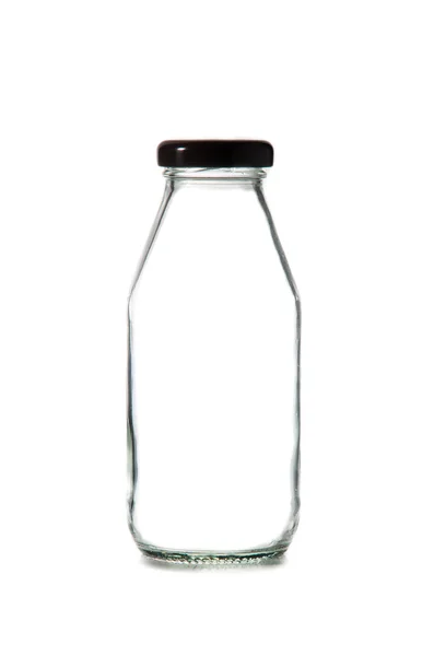 Botol kaca kosong susu dengan topi — Stok Foto