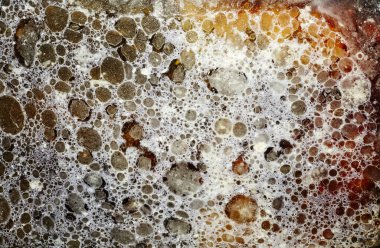 Fırın tepsisinde yağ ve yağ damlaları, doku ve arka plan