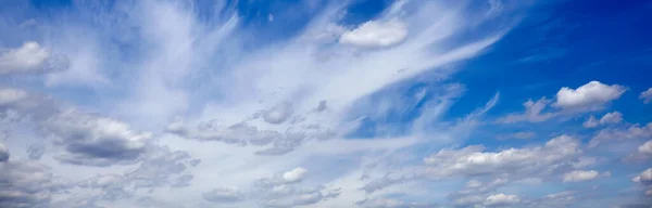 Abstract image of blurred sky. Blue sky background with cumulus clouds