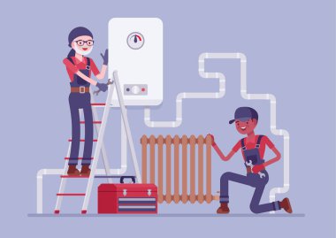 Tesisatçılar tesisat, boru ve radyatör kurulumunu denetliyor.