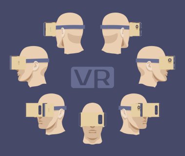 Erkekler kafasına karton sanal gerçeklik kulaklık