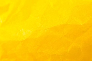 Buruşuk sarı kağıt arka plan. Gerçek makro parçalanmış doku. Fotoğrafı kapat..