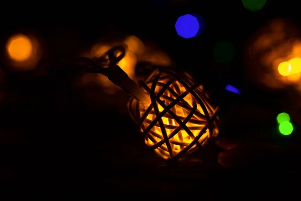 Christmas lights close up photo. Cozy mood in the evening. Festive time. Holidays concept. Happy New Year.