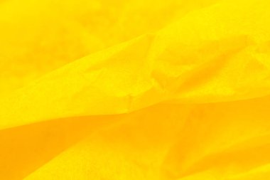 Buruşuk sarı kağıt arka plan. Gerçek makro parçalanmış doku. Fotoğrafı kapat..