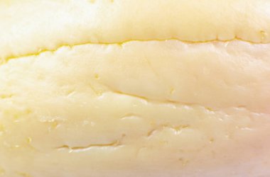 Kemik avokadosunun doğal ahşap dokusu. Bej eko arka plan. Kapat..