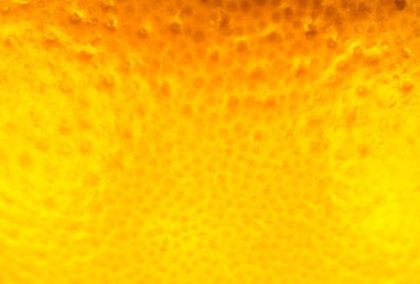 Portakal kabuğunun yakın fotoğrafını çek. Portakallar olgun meyve arka planı, makro manzara. Kapat..