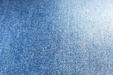 Mavi hippi kot pantolon kumaşı. Denim Kumaş dokusu arkaplanı.