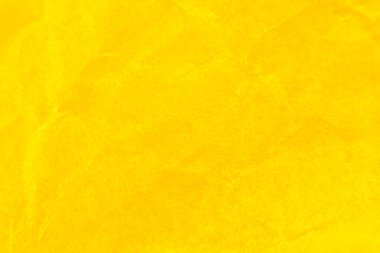 Buruşuk sarı kağıt arka plan. Gerçek makro parçalanmış doku. Fotoğrafı kapat..