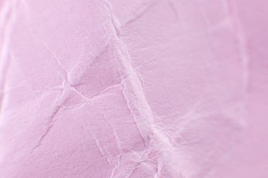 Buruşuk pembe kağıt arka plan. Gerçek makro parçalanmış doku. Fotoğrafı kapat..