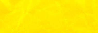 Buruşuk sarı kağıt arka plan. Gerçek makro parçalanmış doku. Fotoğrafı kapat..