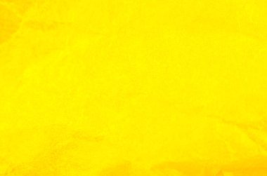 Buruşuk sarı kağıt arka plan. Gerçek makro parçalanmış doku. Fotoğrafı kapat..