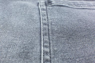 Gri hippi kot pantolon kumaşı. Gri Kumaş dokusu arkaplanı.