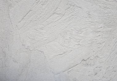 Dekoratif alçı. Gri duvar dokusu arka plan. Somut bir tarz. Kapalı alanda restorasyon. Bakım işi. Evdeki tadilat.