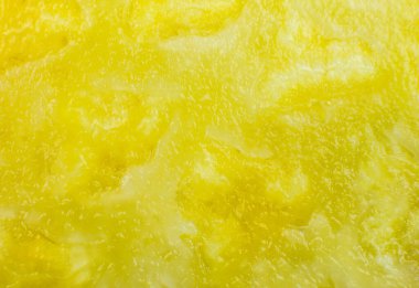 Ananas dokusu arka planı. Egzotik meyveler yakın fotoğraf, makro manzara. Sağlıklı yaşam tarzı yiyecekler. Güzel duvar kağıdı. Vejetaryen ve vejetaryen kavramı. Doğadan gelen vitaminler.