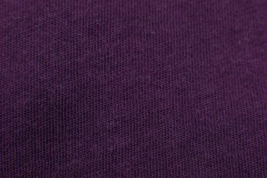 Mor kumaş arkaplan. Giysiler için malzeme.