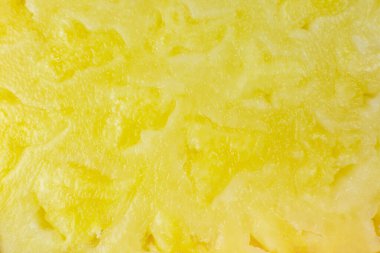 Ananas dokusu arka planı. Egzotik meyveler yakın fotoğraf, makro manzara. Sağlıklı yaşam tarzı yiyecekler. Güzel duvar kağıdı. Vejetaryen ve vejetaryen kavramı. Doğadan gelen vitaminler.