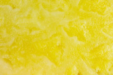 Ananas dokusu arka planı. Egzotik meyveler yakın fotoğraf, makro manzara. Sağlıklı yaşam tarzı yiyecekler. Güzel duvar kağıdı. Vejetaryen ve vejetaryen kavramı. Doğadan gelen vitaminler.