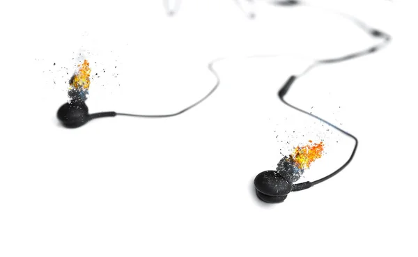 Earphones Burning Fire Lying White Background Modern Music Concept Audio — Stock Photo, Image