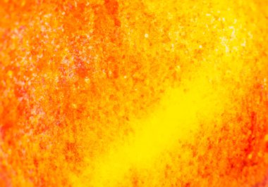 Kırmızı elma arkaplanının yakın fotoğrafını çek. Elma kabuğu dokusu, makro manzara. Güzel doğal duvar kağıdı.