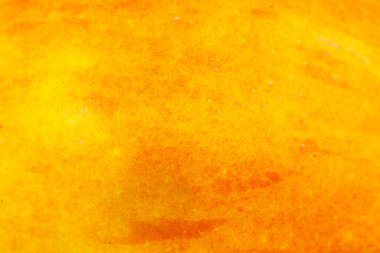 Kırmızı elma arkaplanının yakın fotoğrafını çek. Elma kabuğu dokusu, makro manzara. Güzel doğal duvar kağıdı.