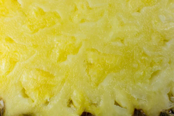パイナップルの食感の背景 エキゾチックなフルーツを閉じる写真 マクロビュー 健康的なライフスタイル食品 美しい壁紙だ ベジタリアンやビーガンのコンセプト 自然のビタミン — ストック写真