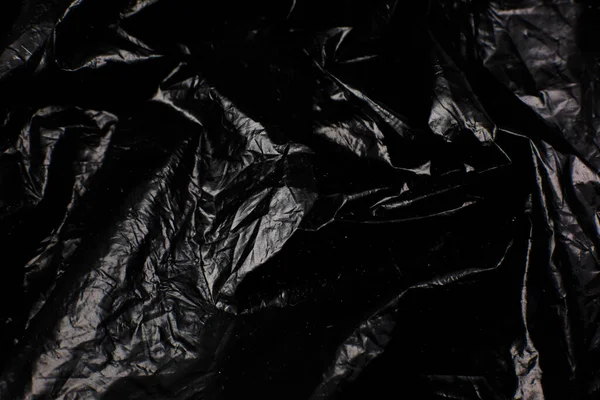 Zgnieciony Czarny Plastikowy Worek Tekstury Tła Polietylenowa Powłoka Błyszcząca — Zdjęcie stockowe