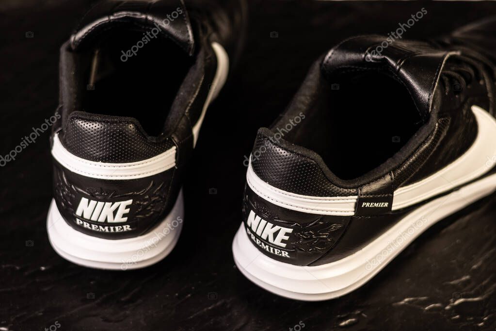 KYIV, UKRAINE - October 18, 2025 : Nike Premier III TF. Turf Low-Top Soccer Shoes. Black and white leather boots.