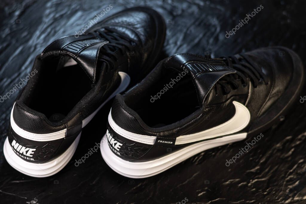 KYIV, UKRAINE - October 18, 2025 : Nike Premier III TF. Turf Low-Top Soccer Shoes. Black and white leather boots.