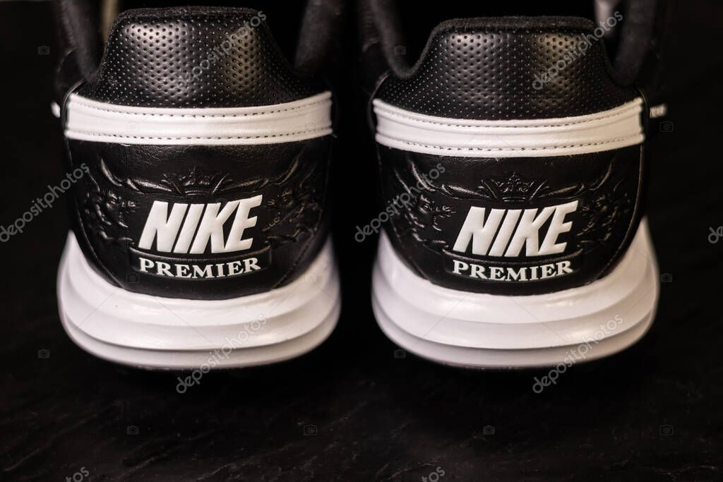 KYIV, UKRAINE - October 18, 2025 : Nike Premier III TF. Turf Low-Top Soccer Shoes. Black and white leather boots.
