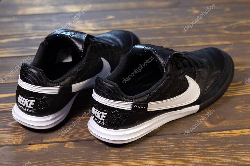 KYIV, UKRAINE - October 18, 2025 : Nike Premier III TF. Turf Low-Top Soccer Shoes. Black and white leather boots.