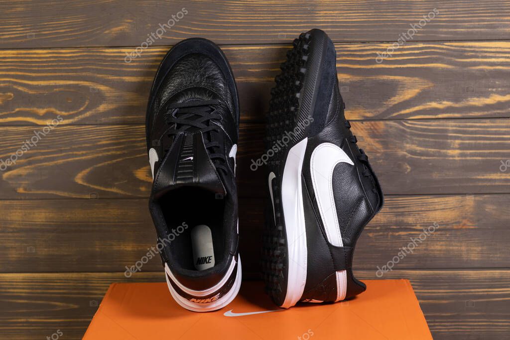 KYIV, UKRAINE - October 18, 2025 : Nike Premier III TF. Turf Low-Top Soccer Shoes. Black and white leather boots.