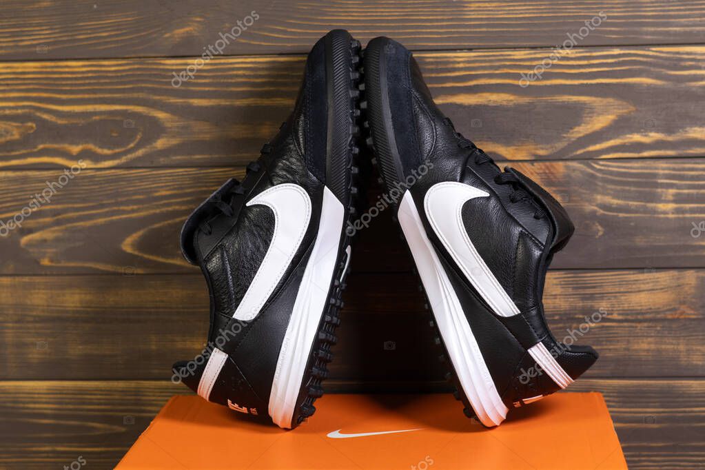 KYIV, UKRAINE - October 18, 2025 : Nike Premier III TF. Turf Low-Top Soccer Shoes. Black and white leather boots.