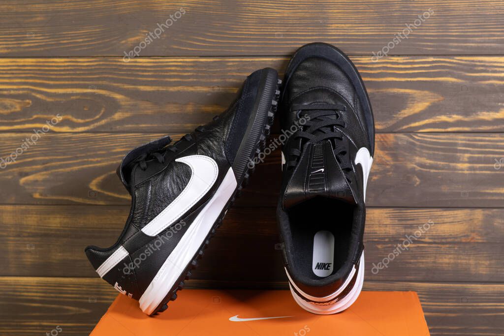 KYIV, UKRAINE - October 18, 2025 : Nike Premier III TF. Turf Low-Top Soccer Shoes. Black and white leather boots.