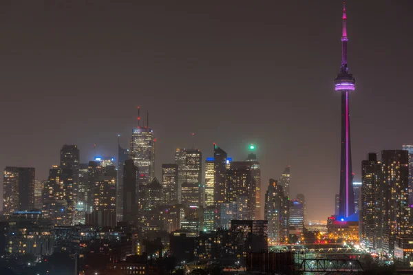 Rain comes down on urban lighted skyline of Toronto. — Stock Photo, Image