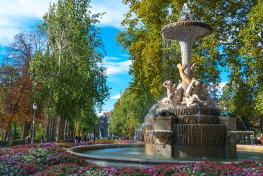 Lovely fountains in the city of Madrid's Retiro park. clipart