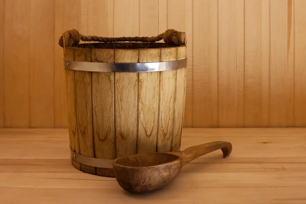Wooden bucket  with  ladle — Stock Photo, Image