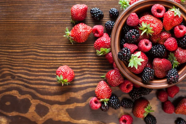 Summer fruits on a wooden table — Stock Photo, Image