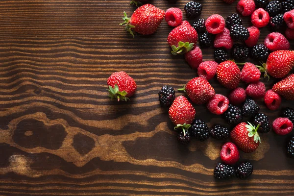 Summer fruits on a wooden table — Stock Photo, Image