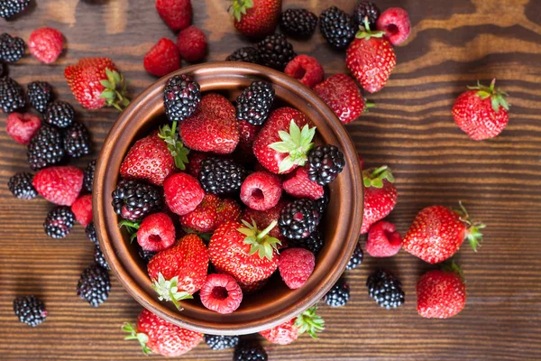 Summer fruits on a wooden table — Stock Photo, Image