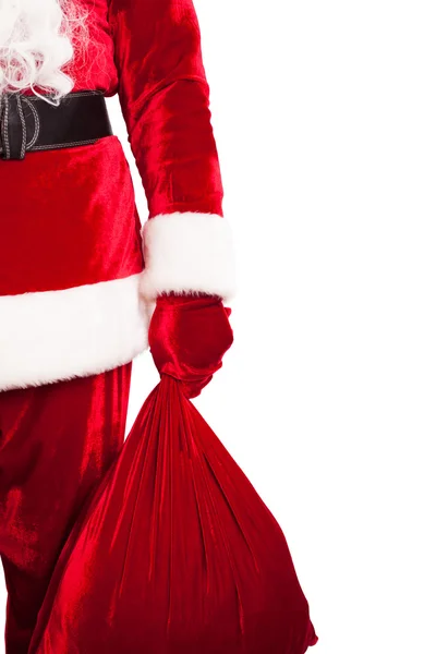 Zbliżenie z Santa Claus dłoń trzymająca czerwony worek — Zdjęcie stockowe