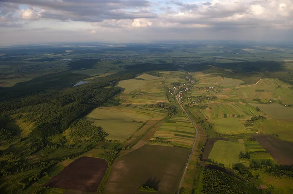 Aerial view on green and yellow parts of fields and countryside — Stock Photo, Image