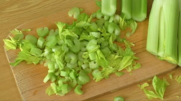 Chef chopping celery in kitchen — Stock Video